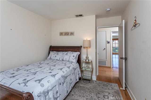 14048 Wagon Mound Rd, Rancho Cascades, CA 91342 - bedroom featuring wood finished floors and baseboards