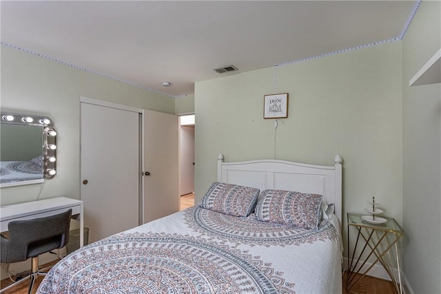 14048 Wagon Mound Rd, Rancho Cascades, CA 91342 - bedroom with wood finished floors and an office area