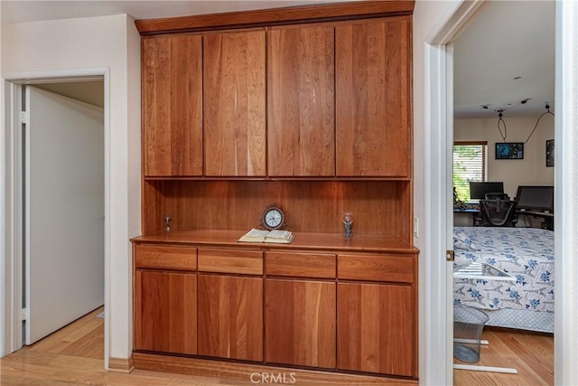 14048 Wagon Mound Rd, Rancho Cascades, CA 91342 - detailed view of wood finished floors and a desk