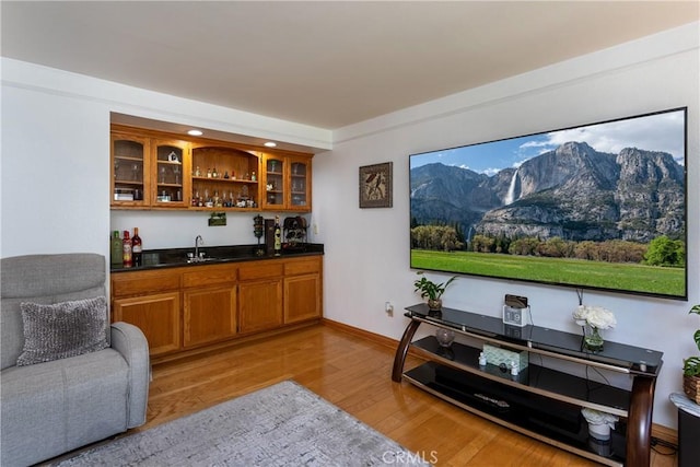 14048 Wagon Mound Rd, Rancho Cascades, CA 91342 - indoor wet bar with light wood-style floors, recessed lighting, and baseboards