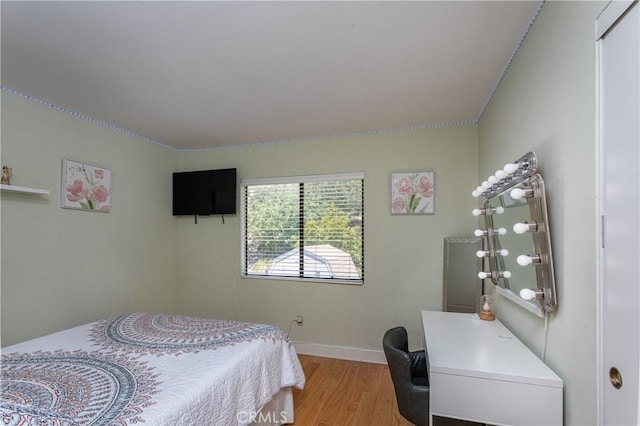 14048 Wagon Mound Rd, Rancho Cascades, CA 91342 - bedroom featuring light wood finished floors and baseboards