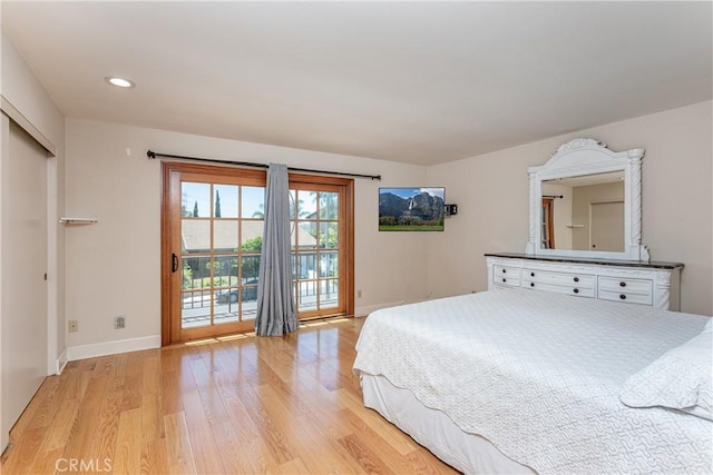 14048 Wagon Mound Rd, Rancho Cascades, CA 91342 - bedroom featuring access to exterior, light wood-style floors, baseboards, and recessed lighting