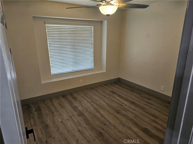 12860 Perris Blvd Unit D6, Moreno Valley, CA 92553 - spare room with ceiling fan, baseboards, and dark wood-style flooring