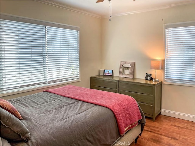 5253 Deeboyar, Lakewood, CA 90712 - bedroom featuring ornamental molding, light wood-style floors, baseboards, and a ceiling fan