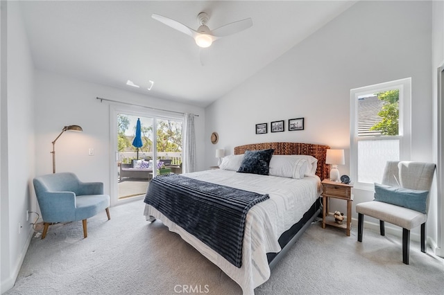 bedroom with light colored carpet, access to exterior, vaulted ceiling, baseboards, and a ceiling fan