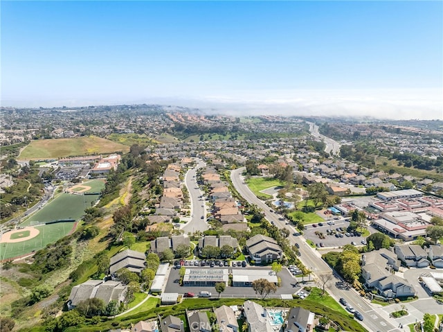 aerial view of property's location with nearby suburban area