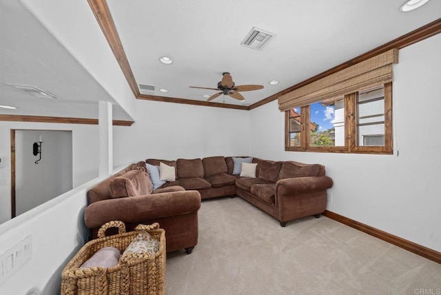 living area featuring ornamental molding, ceiling fan, baseboards, light colored carpet, and recessed lighting