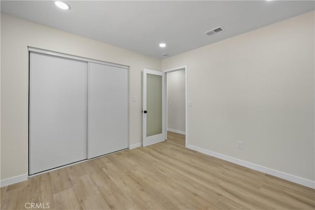 40635 159th St E, Lancaster, CA 93535 - unfurnished bedroom featuring wood finished floors, baseboards, recessed lighting, and a closet