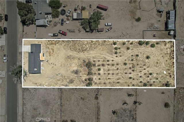 40635 159th St E, Lancaster, CA 93535 - aerial view of property's location with property parcel outlined and a desert landscape