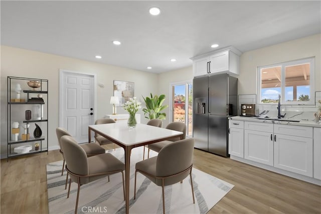 40635 159th St E, Lancaster, CA 93535 - dining space with light wood-style flooring and recessed lighting