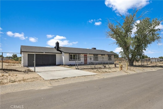 40635 159th St E, Lancaster, CA 93535 - ranch-style house with an attached garage, driveway, and fence