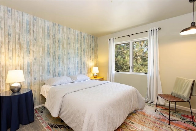 1517 Woodland Dr, Pine Mountain Club, CA 93222 - bedroom with wallpapered walls, an accent wall, and baseboards