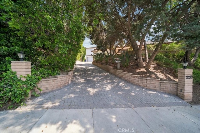 12218 Sarazen Pl, Granada Hills, CA 91344 - view of property's community featuring a garage