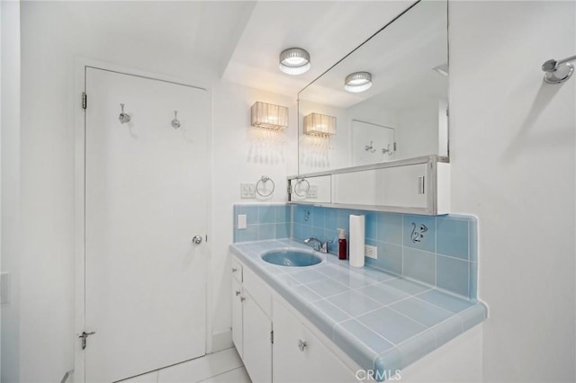 12218 Sarazen Pl, Granada Hills, CA 91344 - bathroom with tasteful backsplash and vanity