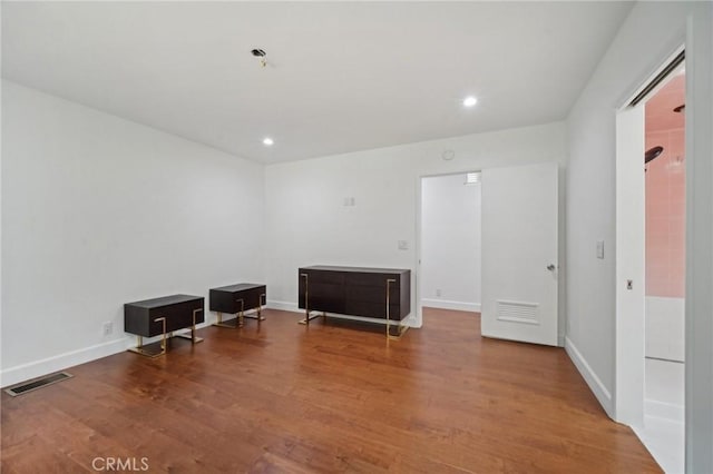 12218 Sarazen Pl, Granada Hills, CA 91344 - miscellaneous room featuring wood finished floors, recessed lighting, and baseboards