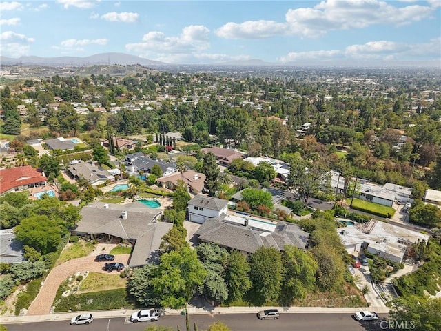 12218 Sarazen Pl, Granada Hills, CA 91344 - aerial overview of property's location with mountains and nearby suburban area