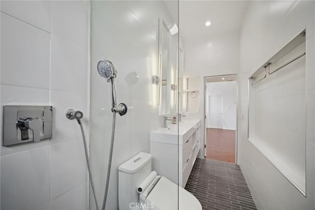 12218 Sarazen Pl, Granada Hills, CA 91344 - bathroom featuring toilet, a shower, vanity, and recessed lighting