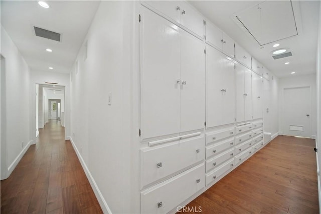 12218 Sarazen Pl, Granada Hills, CA 91344 - corridor with attic access, dark wood finished floors, recessed lighting, and baseboards
