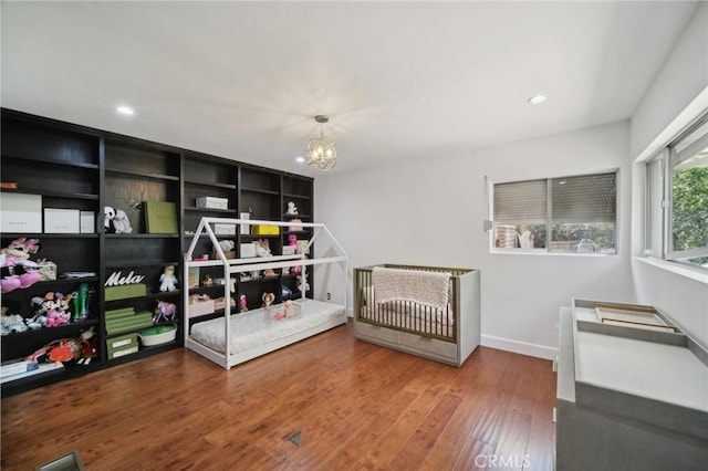 12218 Sarazen Pl, Granada Hills, CA 91344 - bedroom with a chandelier, wood finished floors, baseboards, and recessed lighting