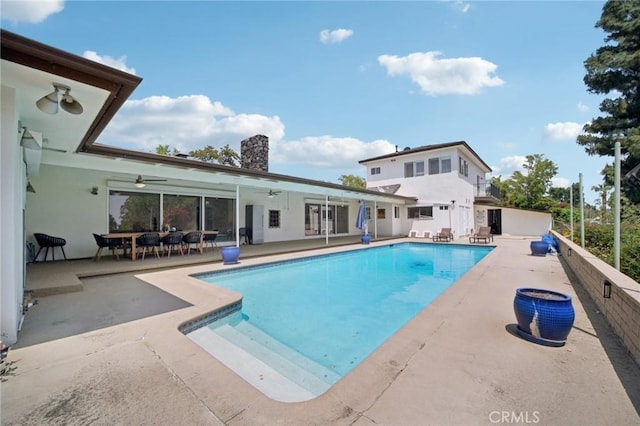 12218 Sarazen Pl, Granada Hills, CA 91344 - swimming pool featuring a ceiling fan and a patio area