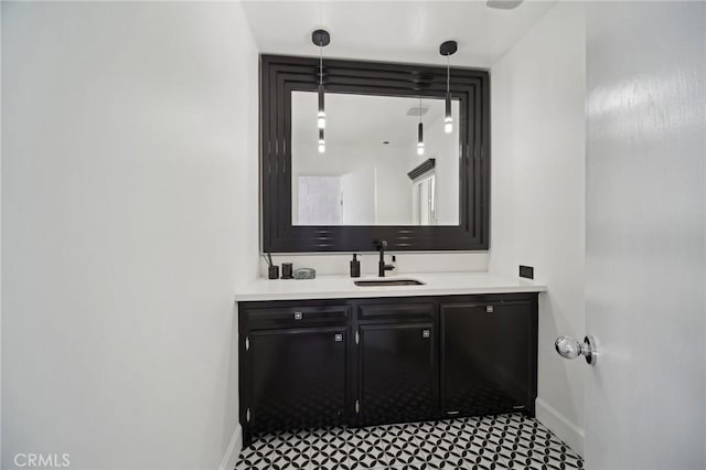 12218 Sarazen Pl, Granada Hills, CA 91344 - bathroom featuring baseboards and vanity
