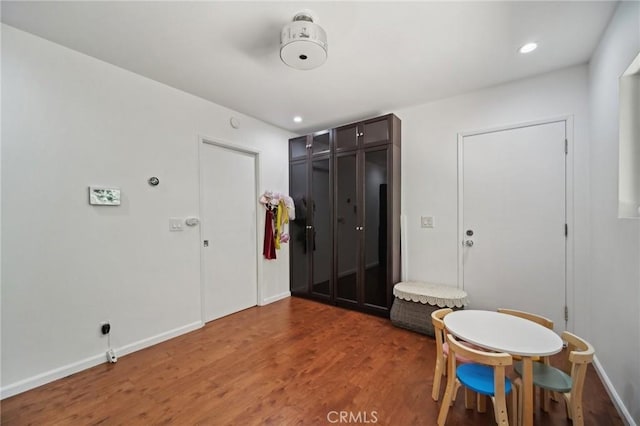 12218 Sarazen Pl, Granada Hills, CA 91344 - dining space with wood finished floors, recessed lighting, and baseboards