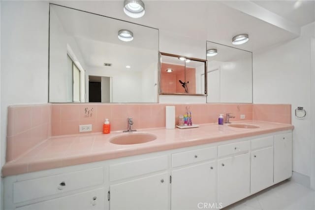 12218 Sarazen Pl, Granada Hills, CA 91344 - full bath with tasteful backsplash and double vanity