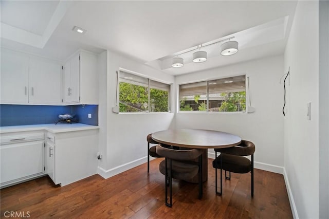 12218 Sarazen Pl, Granada Hills, CA 91344 - dining space with baseboards and dark wood-style floors