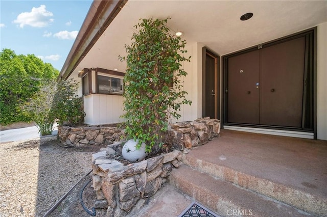 12218 Sarazen Pl, Granada Hills, CA 91344 - view of exterior entry with stucco siding