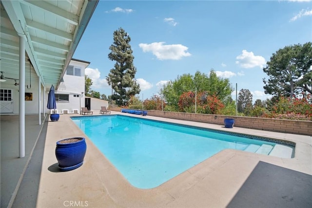 12218 Sarazen Pl, Granada Hills, CA 91344 - view of swimming pool with a patio