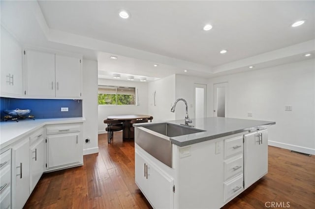 12218 Sarazen Pl, Granada Hills, CA 91344 - kitchen with a sink, a raised ceiling, dark wood finished floors, white cabinets, and recessed lighting