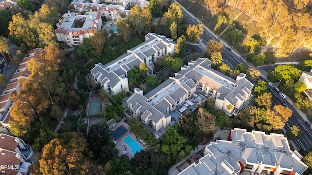 aerial view of property's location with nearby suburban area