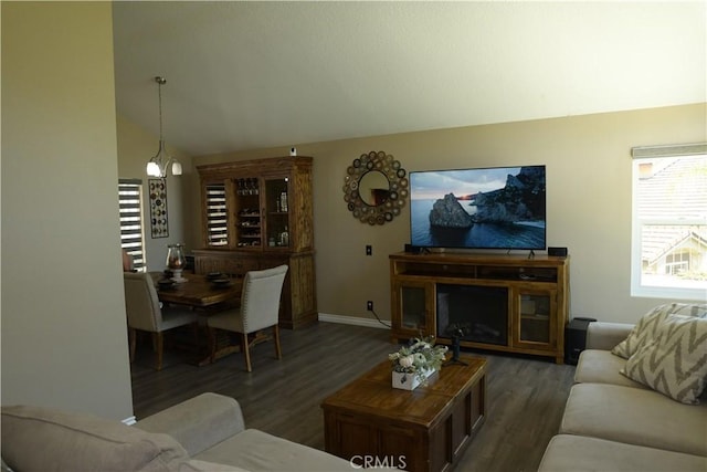 16971 Lakepointe Dr, Riverside, CA 92503 - living area with wood finished floors, lofted ceiling, baseboards, and a chandelier
