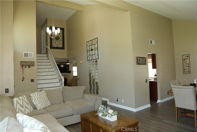 16971 Lakepointe Dr, Riverside, CA 92503 - living room featuring high vaulted ceiling, stairs, baseboards, wood finished floors, and a chandelier