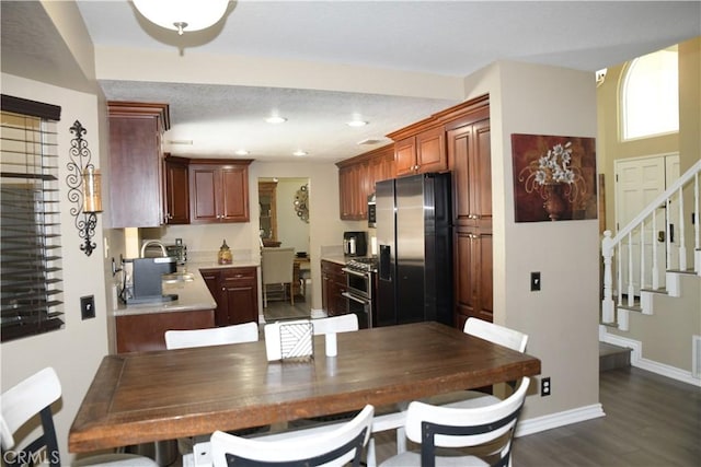 16971 Lakepointe Dr, Riverside, CA 92503 - dining room with stairs, dark wood-type flooring, recessed lighting, and baseboards
