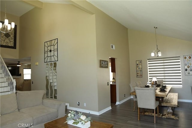 16971 Lakepointe Dr, Riverside, CA 92503 - dining space featuring stairs, high vaulted ceiling, a chandelier, baseboards, and wood finished floors