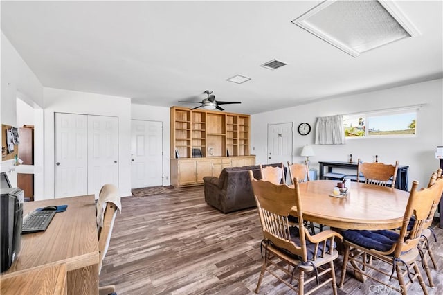 7599 Joshua Ln, Yucca Valley, CA 92284 - dining room with a ceiling fan, attic access, and wood finished floors