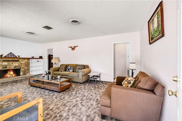 7599 Joshua Ln, Yucca Valley, CA 92284 - carpeted living room with a textured ceiling and a fireplace