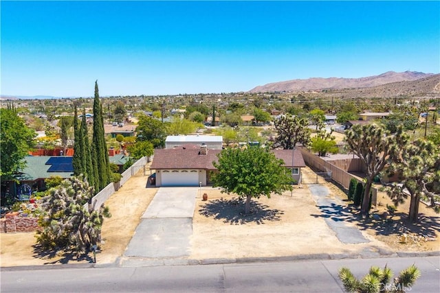 7599 Joshua Ln, Yucca Valley, CA 92284 - aerial view of property and surrounding area with mountains