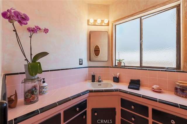 3784 Newton St, Torrance, CA 90505 - bathroom with plenty of natural light, decorative backsplash, and vanity