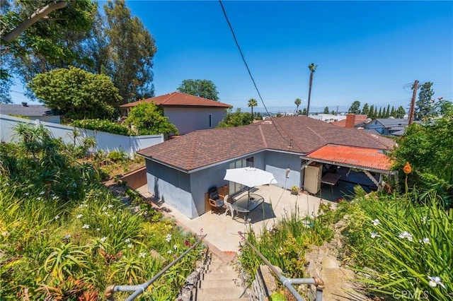 3784 Newton St, Torrance, CA 90505 - rear view of house with a patio, a fenced backyard, and stucco siding