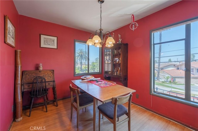 3784 Newton St, Torrance, CA 90505 - dining space with a chandelier and light wood-style flooring