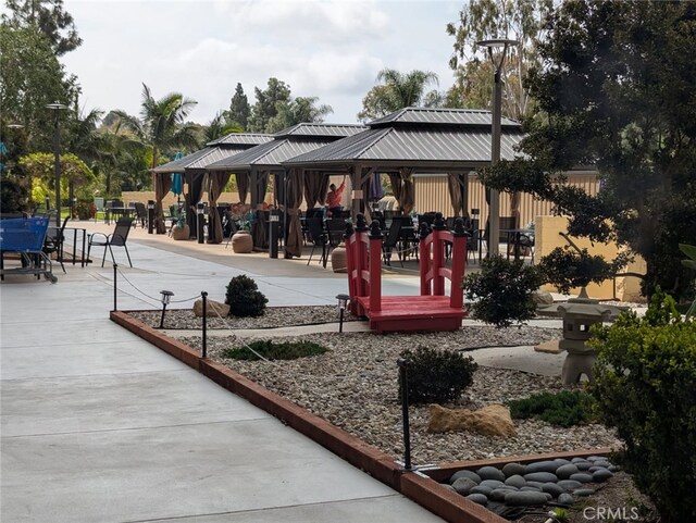 24055 Paseo Del Lago Unit 963, Laguna Woods, CA 92637 - view of property's community with a gazebo