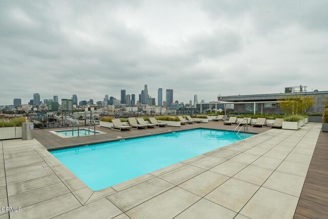 510 S Hewitt St Unit 106, Los Angeles, CA 90013 - community pool featuring a skyline view, outdoor lounge area, and a patio