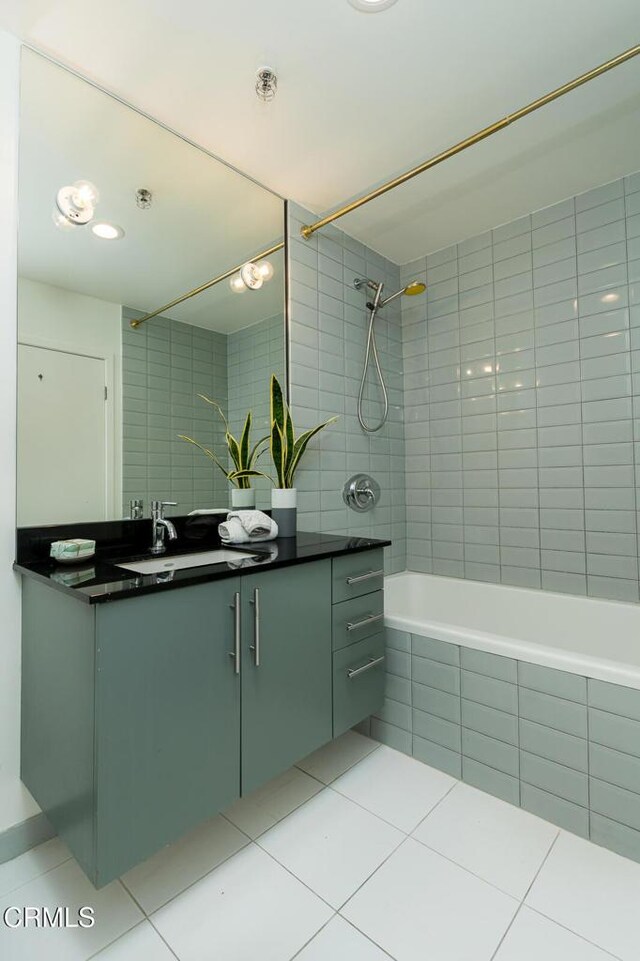 510 S Hewitt St Unit 106, Los Angeles, CA 90013 - bathroom featuring tiled shower / bath, vanity, and tile patterned floors