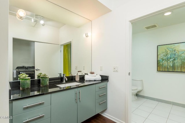 510 S Hewitt St Unit 106, Los Angeles, CA 90013 - bathroom featuring vanity and washer / dryer