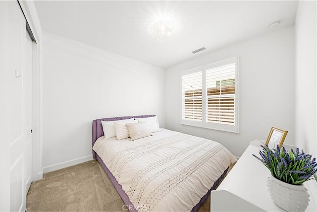 114 Yuba, Irvine, CA 92620 - bedroom featuring light carpet, a closet, and baseboards