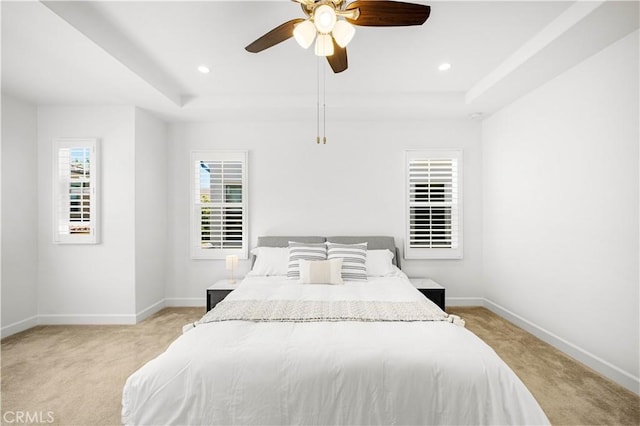 114 Yuba, Irvine, CA 92620 - bedroom featuring light carpet, a tray ceiling, baseboards, recessed lighting, and a ceiling fan