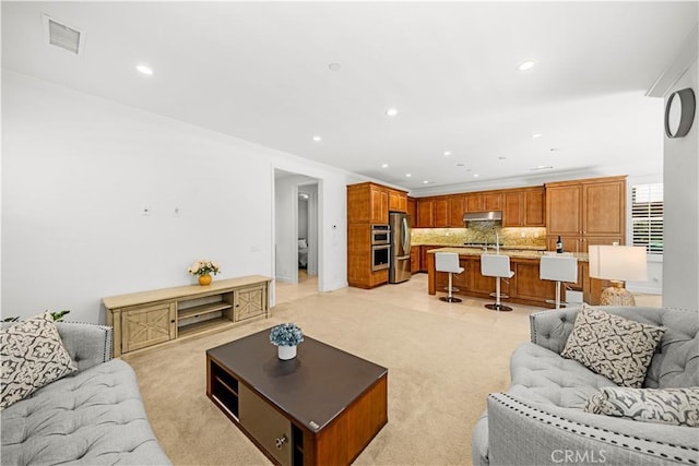 114 Yuba, Irvine, CA 92620 - living area with recessed lighting and light carpet