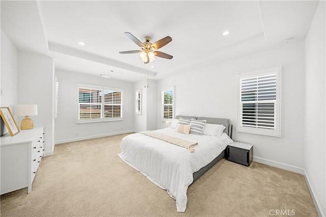 114 Yuba, Irvine, CA 92620 - bedroom featuring a raised ceiling, light colored carpet, baseboards, recessed lighting, and ceiling fan